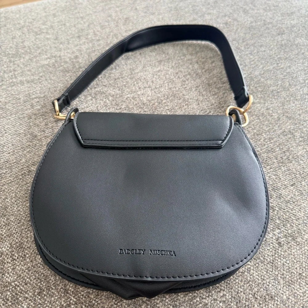Bagley Mischka Timeless Black and Gold Leather Shoulder Bag with Saddle Design